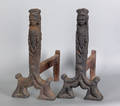 Pair of cast iron Native American form andirons 19th c
