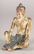 Carved and Painted Wooden Image of a Seated Man