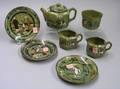 FourPiece 1908 Buffalo Pottery Deldare Ware Breaking Cover Tea Set and Three Assorted Saucers