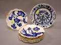 Set of Eight Gilt Flow Blue Floral Porcelain Plates and a Blue Onion Pattern Platter