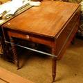 Late Federal Carved Mahogany Dropleaf Table