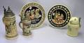 Three German Lidded Stoneware Steins and Stoneware Christmas and Fathers Day Plaques