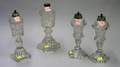 Four Colorless Pressed Glass Whale Oil Lamps