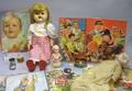 Seven Mid20th Century Childrens Chromolithograph Puzzles Two Dolls and Miscellaneous Toys and Articles