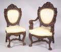 Set of Ten Renaissance Revival Carved Oak Dining Chairs