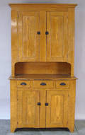 Grain painted twopart stepback cupboard