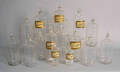 Eighteen blown glass apothecary bottles