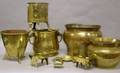 Two Brass Jardinieres Three Brass Planters an Elephantform Dish and Three Pieces of Miniature Brass Furniture