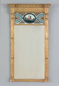 Federal carved and gilded wall mirror with eglomise decoration early 19th c
