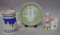 Copeland Salt Glazed Pitcher a Green Bisque Plaque and a Continental Porcelain Figural