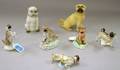 Seven Assorted Porcelain Pug Dog Figurals