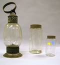 Blown Glass and Tin Lantern and Two Colorless Glass Jars with Tin Lids