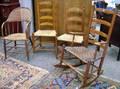Slatback Armrocker Two Side Chairs and a Caned Ash Sackback Armchair