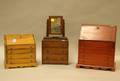 Two Miniature Stained Pine Slantlid Desks and a Walnut Mirrored Dresser