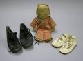 Two Pairs of Late 19thEarly 20th Century Childs Leather Shoes and a Cloth Doll