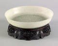 Superb Qing dynasty carved pale celedon green jade Mughal style low circular bowl 18th c