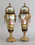 Pair of Sevres cobalt lidded urns late 19th c