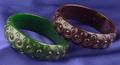 Two Bakelite Carved and Pierced Bullseye Bangles