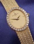 Ladys 18kt Gold and Diamond Wristwatch Baume  Mercier