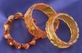 Three Bakelite Carved Apple Juice Bangles