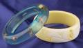Lucite Transparent Insect and Hard Plastic Yellow Swirl Carved Bangle