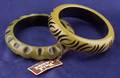 Two Bakelite Carved Green and Black Bangles