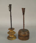 Two wrought iron candlesticks 18th c