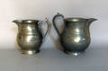 Two pewter pitchers