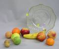 Eleven Pieces of Painted Carved Stone Fruit and Nuts in an Art Deco Colorless Molded Glass Bowl