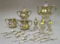 Twentytwo Pieces of Sterling Silver and Silver Plated Hollowware and Flatware
