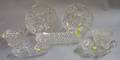 Five Colorless Cut Glass Bowls and Two Trays
