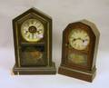 Atkins Clock Co Rosewood Veneer Shelf Clock and a Black Painted Waterbury Clock Co Shelf Clock