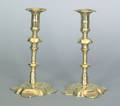 Pair of English Queen Anne brass petal base candlesticks ca 1750