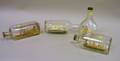 Four Folk Painted Ships in Bottles