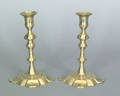 Pair of English Queen Anne brass petal base candlesticks ca 1750