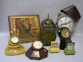 Seven Assorted Clocks and a Retailers Advertising Plaque