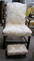 Chippendalestyle Upholstered Mahogany Armchair with an Upholstered Footstool
