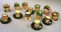 Thirteen Small Royal Doulton Character Jugs and Smoking Items