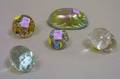 Iridescent Art Glass Scarab Paperweight and Four Assorted Art Glass Paperweights