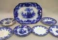 Six Assorted Flow Blue Plates and a Flow Blue Scinde Pattern Platter