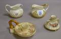 Royal Worcester Porcelain Bambooform Chamberstick and TwoHandled Footed Vase and Two Lotusware Gilt Porcelain Creamers