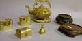 Benningtontype Glazed Pottery Footed Tea Kettle and Circular Tile Three Brass Boxes a Bell and Two Asian Carved Hardwood Plant Stan