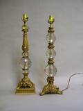 Two Neoclassical Gilt Cast Metal and Colorless Glass Mounted Table Lamps
