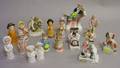 Seventeen Assorted Small Porcelain Figures and Figural Groups
