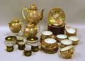 Thirtythree Piece Japanese Satsuma Porcelain Partial Tea Set and an ElevenPiece Japanese Porcelain Partial Demitasse Set