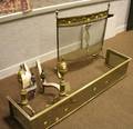 Pair of Brass Faceted Lemontop Andirons a Neoclassical Brass Fireplace Screen and a Pierced Brass Fender