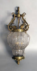 Brass and colorless glass chandelier