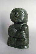 Carved stone figure