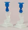 Pair of Blue and Clambroth Glass Dolphin Candle Sticks