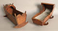 Two pine doll cradles